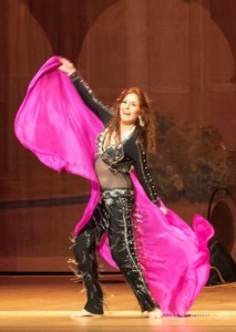 Dhyanis, a 40-year veteran of bellydance, on stage at Rakkasah West 2015.